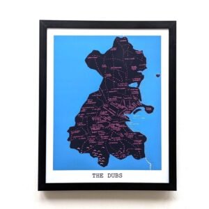 Framed blue map of County Dublin labelled "The Dubs." Map features the names of GAA clubs throughout the county. Simple, modern design on a plain wall.