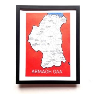 Framed artwork showing a map of Armagh GAA clubs against a red background. The map is detailed with club names, conveying a sense of local pride.