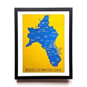 Framed art featuring a blue map of Roscommon GAA on a vibrant yellow background. Place names are visible, with bold text "Roscommon GAA" below.