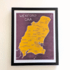 Framed map of Wexford GAA. Yellow county outline with town names on a purple background. Bold text at the top reads “Wexford GAA.”