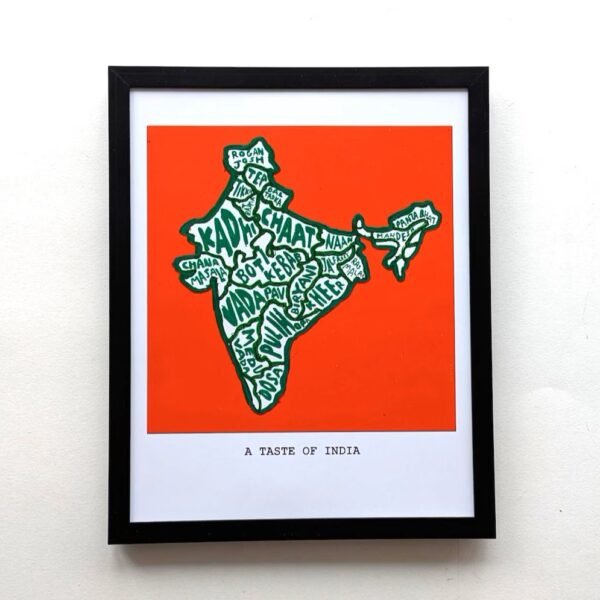 Framed artwork of India's map filled with food names on a dark orange background, captioned "A Taste of India." Bold colours evoke cultural richness.