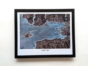 Framed map of Clew Bay, showing detailed labeled coastlines and islands in blue and black. The artistic style conveys a vintage, nautical feel.