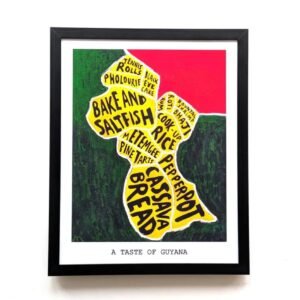 Framed artwork of Guyana's map with names of traditional dishes on a red and green background, titled "A Taste of Guyana," on a white wall.