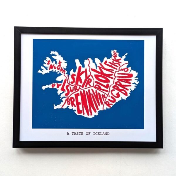 Framed illustration of Iceland's map filled with red food names on a blue background. Text below reads "A Taste of Iceland." Bold and artistic.