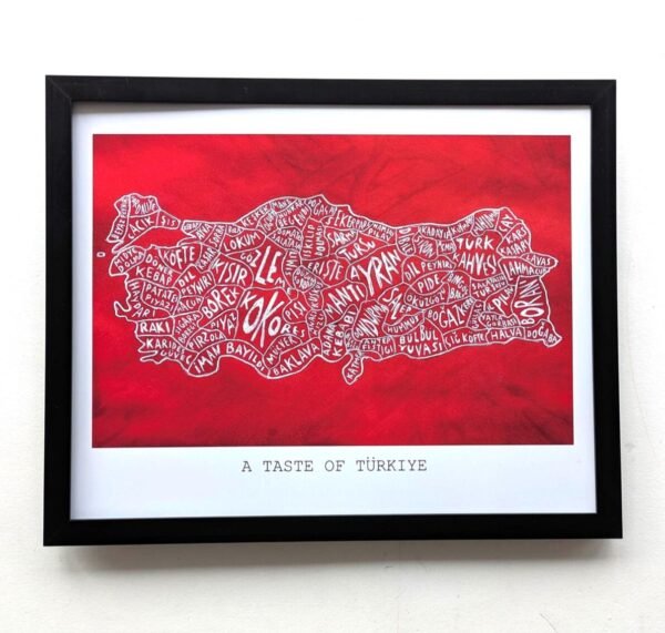 Framed artwork titled "A Taste of Türkiye" features a map of Turkey filled with names of foods, set against a vibrant red background.
