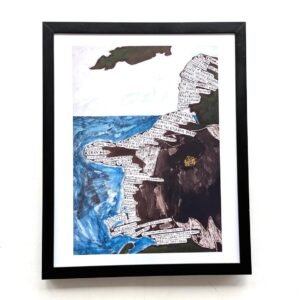 A framed map of north Kerry features a landscape with blue ocean, brown land, and handwritten text. The text forms the shape of a coastal figure, creating a whimsical and thoughtful tone.