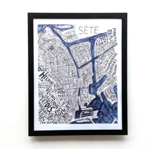 Framed artistic map of Sète featuring hand-drawn streets and landmarks in black ink, conveying a sense of detailed intricacy and urban exploration.