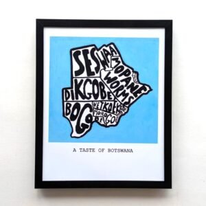 Framed art piece titled "A Taste of Botswana" features a stylized map with bold, black text listing dishes. The map is set against a blue background.