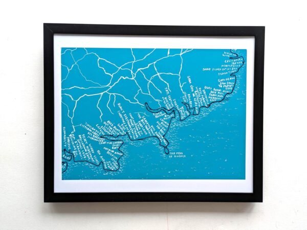 A framed map of west Cork on a teal background. White lines and labels show geographical details and place names, creating a detailed, artistic look.