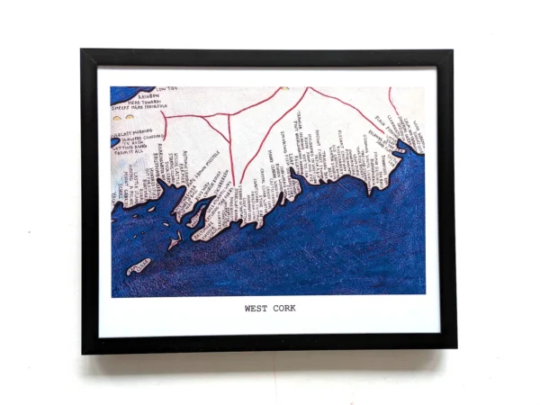 Framed map of West Cork, featuring a detailed coastline drawn in red and blue hues. Place names are visible, conveying a sense of exploration.