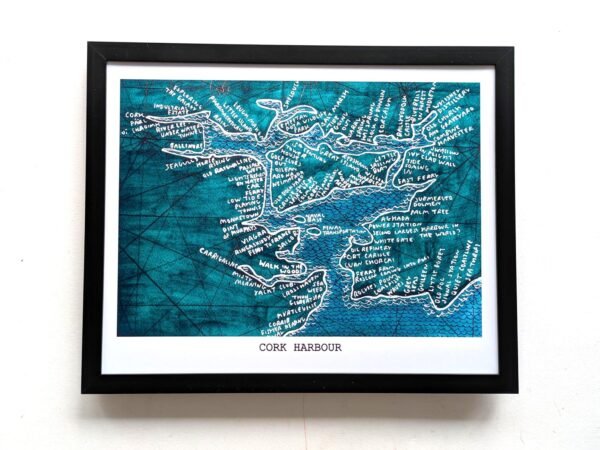 Framed Cork Harbour map illustration showing intricate handwriting on a textured teal background. The artistic map highlights details and locations.