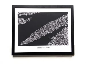 Black and white illustrated map of Sheep's Head with place names creatively arranged. Set in a black frame, the tone is artistic and whimsical.