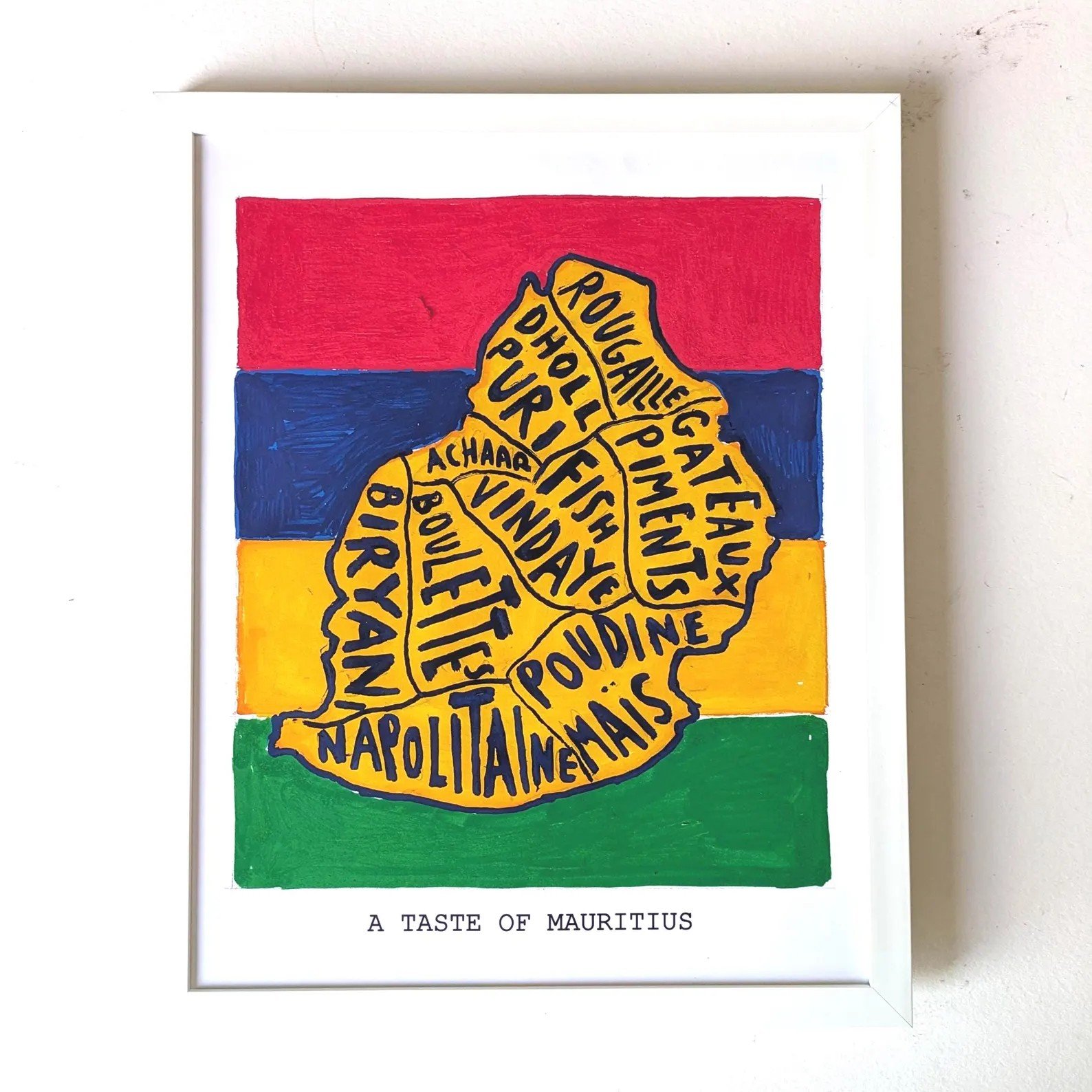 Framed artwork of Mauritius map, filled with local dish names, overlays red, blue, yellow, green stripes. Text below reads "A Taste of Mauritius."
