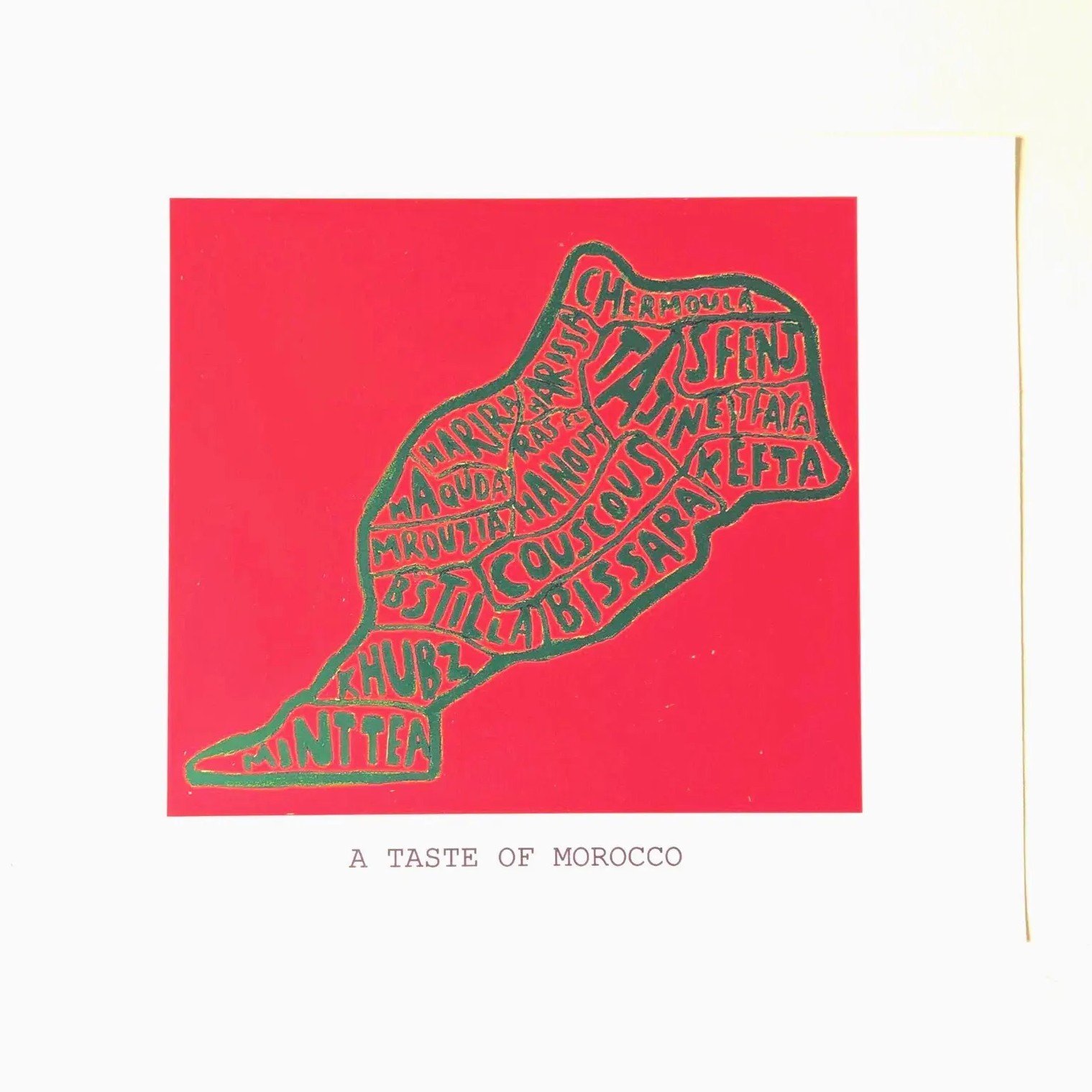 Map of Morocco filled with words like "Couscous," "Kefta," and "Mint Tea" on a red background. Text below reads: "A Taste of Morocco."